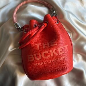 Marc Jacob’s hot orange bucket bag small